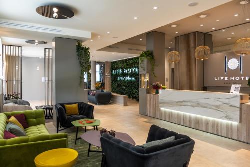 Un lugar para sentarse en Life Hotel 4 Superior