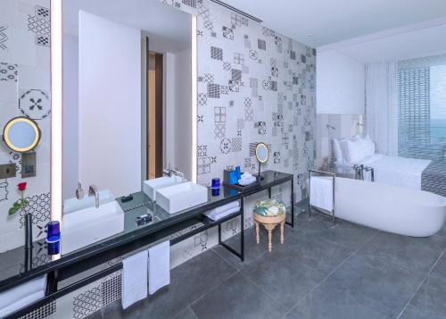  The Oberoi Beach Resort, Al Zorah -  Room  picture :    Tea/Coffee maker    Minibar    Safety deposit box                