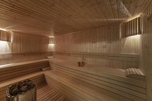 a large wooden sauna with a tub in it at Kaya İstanbul Fair & Convention in Istanbul