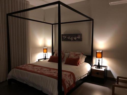 Cama o camas de una habitación en Penthouse 3 chambres Vue Lagon imprenable