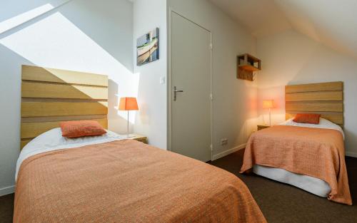 Кровать или кровати в номере Lagrange Vacances Cap Green