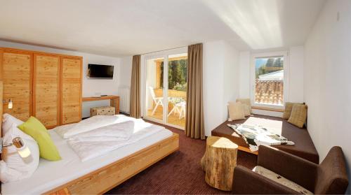 Postel nebo postele na pokoji v ubytování Hotel zum See