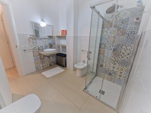 Koupelna v ubytování iMama' Rooms