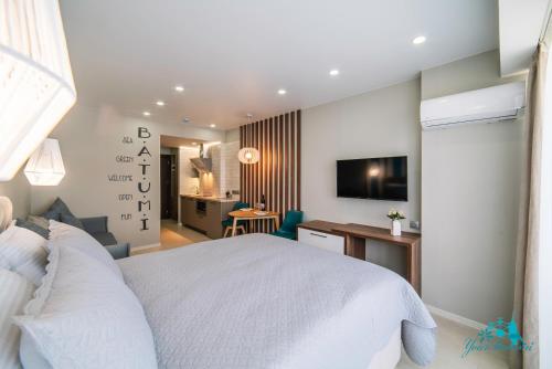 Your Beach Tower tesisinde bir televizyon ve/veya eğlence merkezi