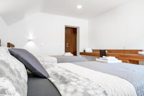Sobe in apartmaji Bamaにあるベッド