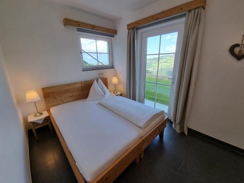 Ένα ή περισσότερα κρεβάτια σε δωμάτιο στο Appartment Schwarzenauer