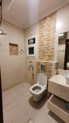 Imagen de la galería de TAQAH SEA APARTMENT, en Salalah
