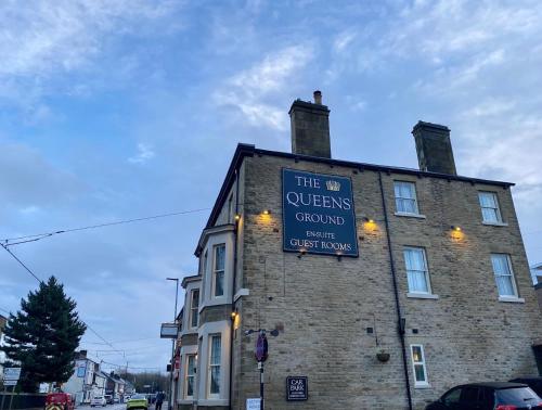 a building with a sign on the side of it at Queens Ground in Sheffield