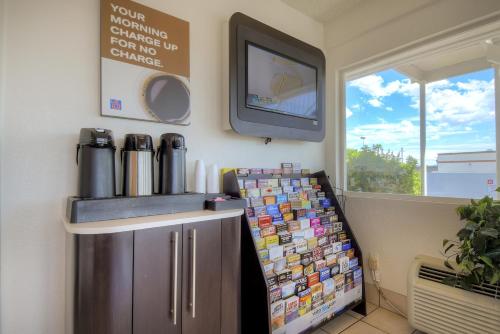 a kitchen with a counter and a tv on the wall at Las Vegas, NV - Boulder Highway in Las Vegas
