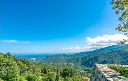 a view of the ocean from a mountain at Stunning Home In Magliolo in Magliolo
