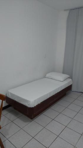 Ein Bett oder Betten in einem Zimmer der Unterkunft MANAAKI Apart Hotel
