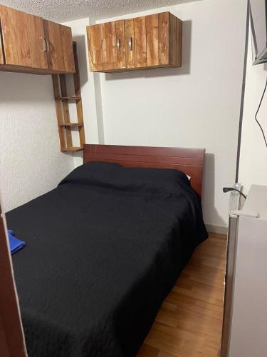 Ένα ή περισσότερα κρεβάτια σε δωμάτιο στο Apartaestudio calle 97204