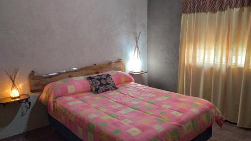 Postel nebo postele na pokoji v ubytování Cabaña El Morito