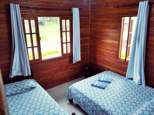 Voodi või voodid majutusasutuse Casa Nova! Na praia do Itaguaçú - SFS toas