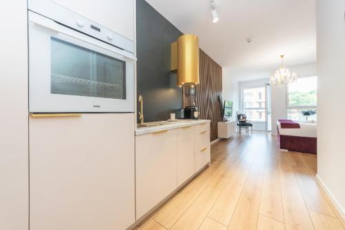 Kuchyňa alebo kuchynka v ubytovaní Bastion Wałowa Apartament Śródmieście centrum Gdansk