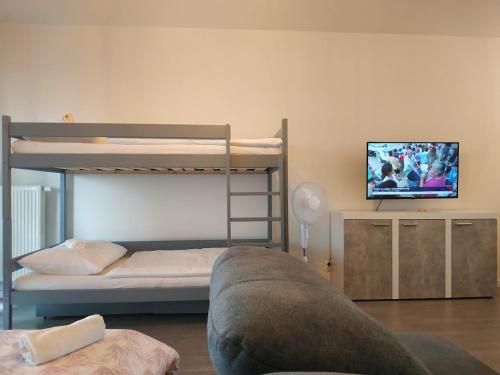 Katil atau katil-katil dalam bilik di Apartmán One To One