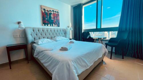 Postel nebo postele na pokoji v ubytování C Tower Apartments