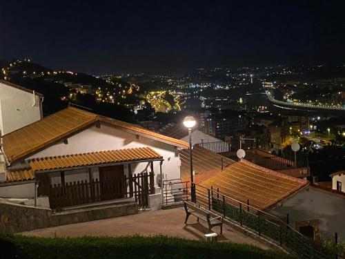a view of a city at night with a street light at Caramelo in Bilbao