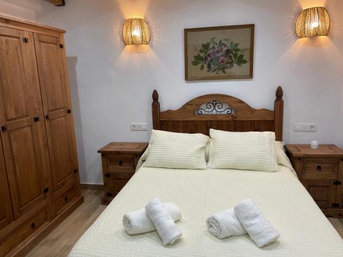Posteľ alebo postele v izbe v ubytovaní Vivienda Turística Rural Casa Irene