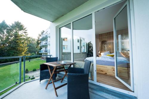 Ein Balkon oder eine Terrasse in der Unterkunft Design-Suite am See