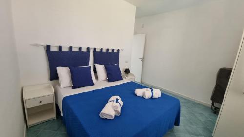 Postel nebo postele na pokoji v ubytování A Casa di Stefy