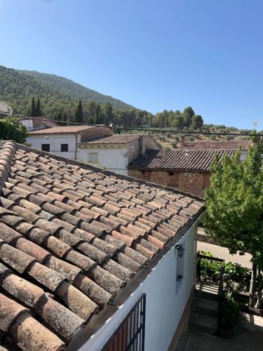 a tile roof of a building in a city at Vivienda Turistica Alojamiento Rural CASA IRENE II in Segura de la Sierra