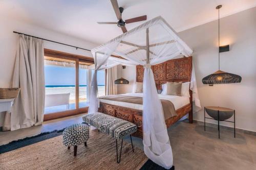 Кровать или кровати в номере Kilua Villa