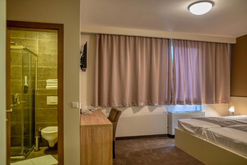 Koupelna v ubytování Hotel Argentum