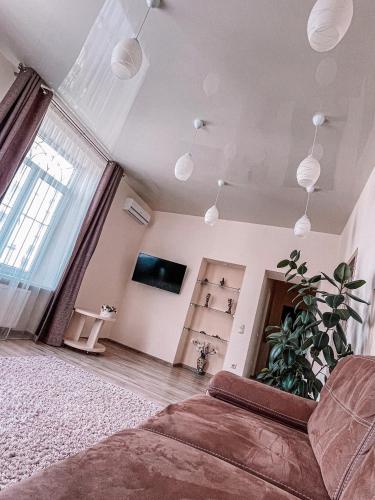 Телевизор и/или развлекательный центр в Family House