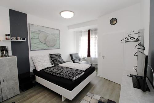 Posteľ alebo postele v izbe v ubytovaní Schickes Ferienapartment in Habichtswald-Ehlen