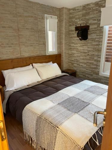 Una cama o camas en una habitación de Arena de mar dept K