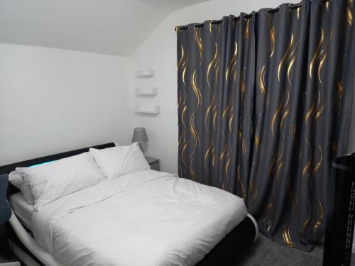 Postel nebo postele na pokoji v ubytování Cozzy Accommodation