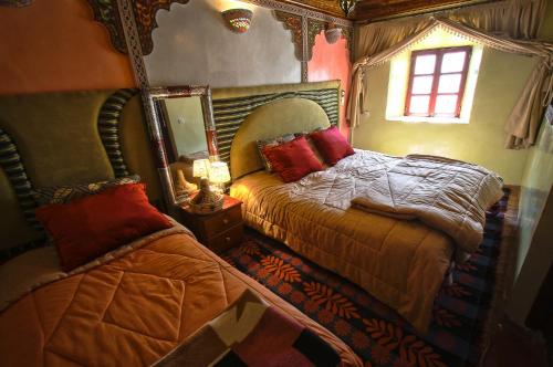 Postel nebo postele na pokoji v ubytování Gîte Atlas Mazik