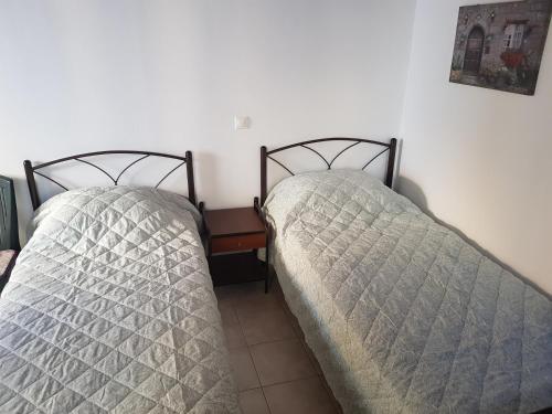 Postel nebo postele na pokoji v ubytování GUEST HOUSE KALLIOPI