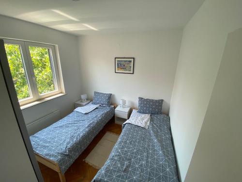 Postel nebo postele na pokoji v ubytování Maris