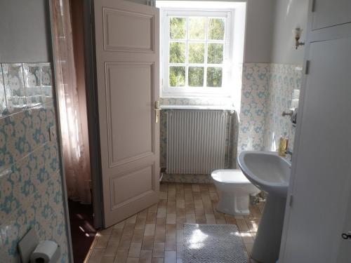 Ванная комната в Domaine de La Héllière