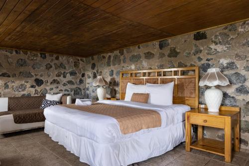 Postel nebo postele na pokoji v ubytování Hacienda Margarita