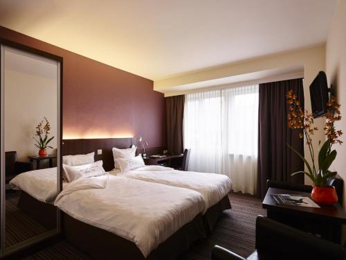 Postel nebo postele na pokoji v ubytování Hotel Europe
