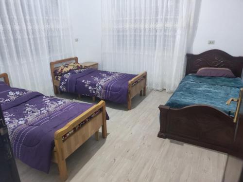 Ένα ή περισσότερα κρεβάτια σε δωμάτιο στο Furnished house بيت مفروش ابو فارس