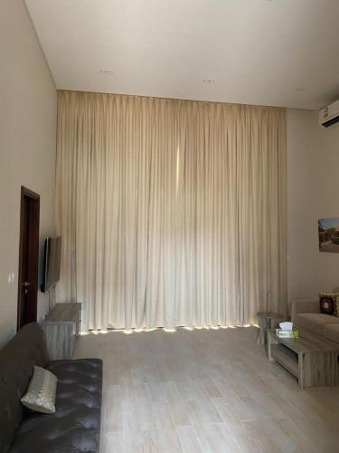 Area soggiorno di Hawana Salalah Villa Lake View