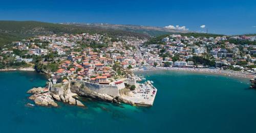 an aerial view of a small island in the water at Villa Guci in Ulcinj