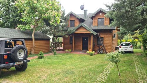 RakówにあるZaciszny dom z plażą nad jeziorem Chańczaのギャラリーの写真