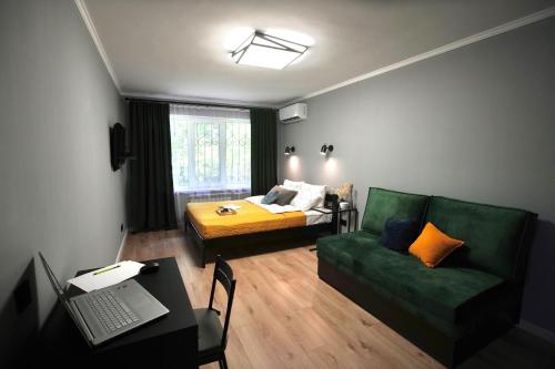 Кровать или кровати в номере Almaty Aparts