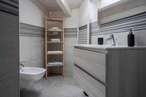 Ванная комната в OLEANDRA ROSSA