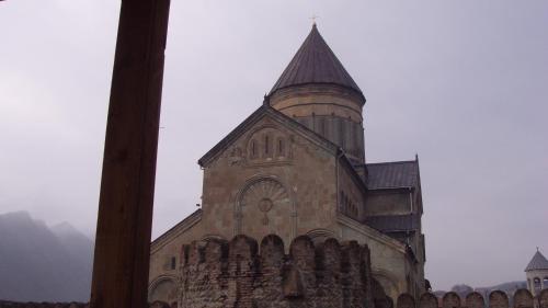an old building with a tower on top of it at Guesthouse Mtskheta-Kapanadze in Mtskheta