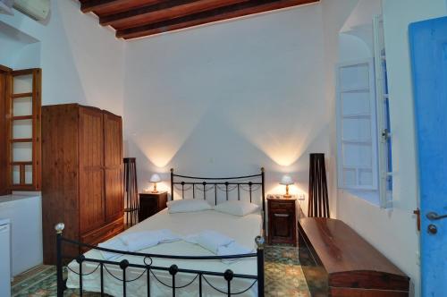מיטה או מיטות בחדר ב-Katerina Rooms