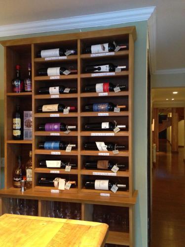 a wine rack filled with lots of wine bottles at Hotel Poincenot in El Chalten