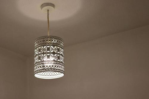 a chandelier hanging from a ceiling in a room at Home Away From Home - 2 Bed FREE Parking & Wifi in Hunslet