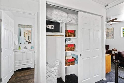 a room with a closet with a bed in it at Family Fun Vacation, Heated Pool, Gameroom, Sauna in Tucson