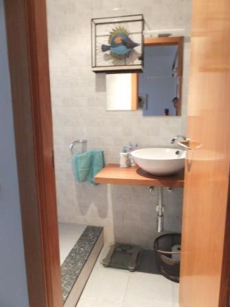 a bathroom with a sink and a mirror at ADRIJUL in Moraira